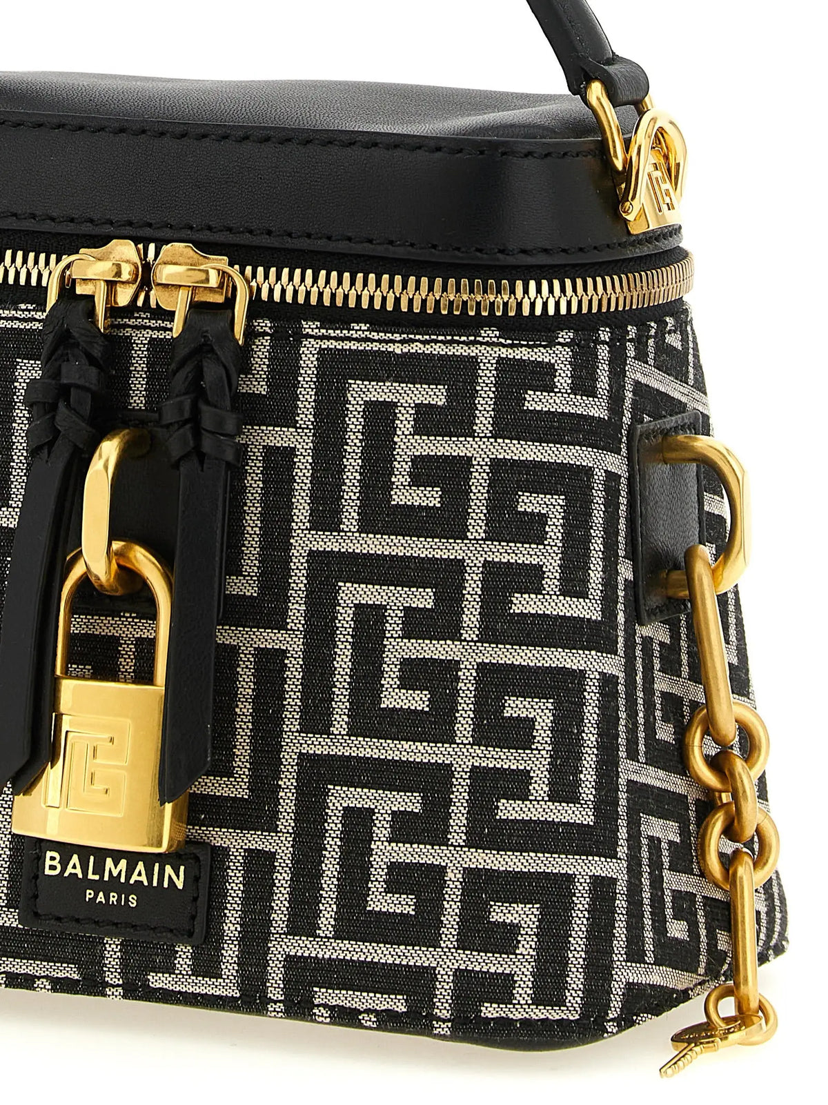 Mini sac balmain paris en polyester bicolore noir et blanc avec motif géométrique et détails dorés