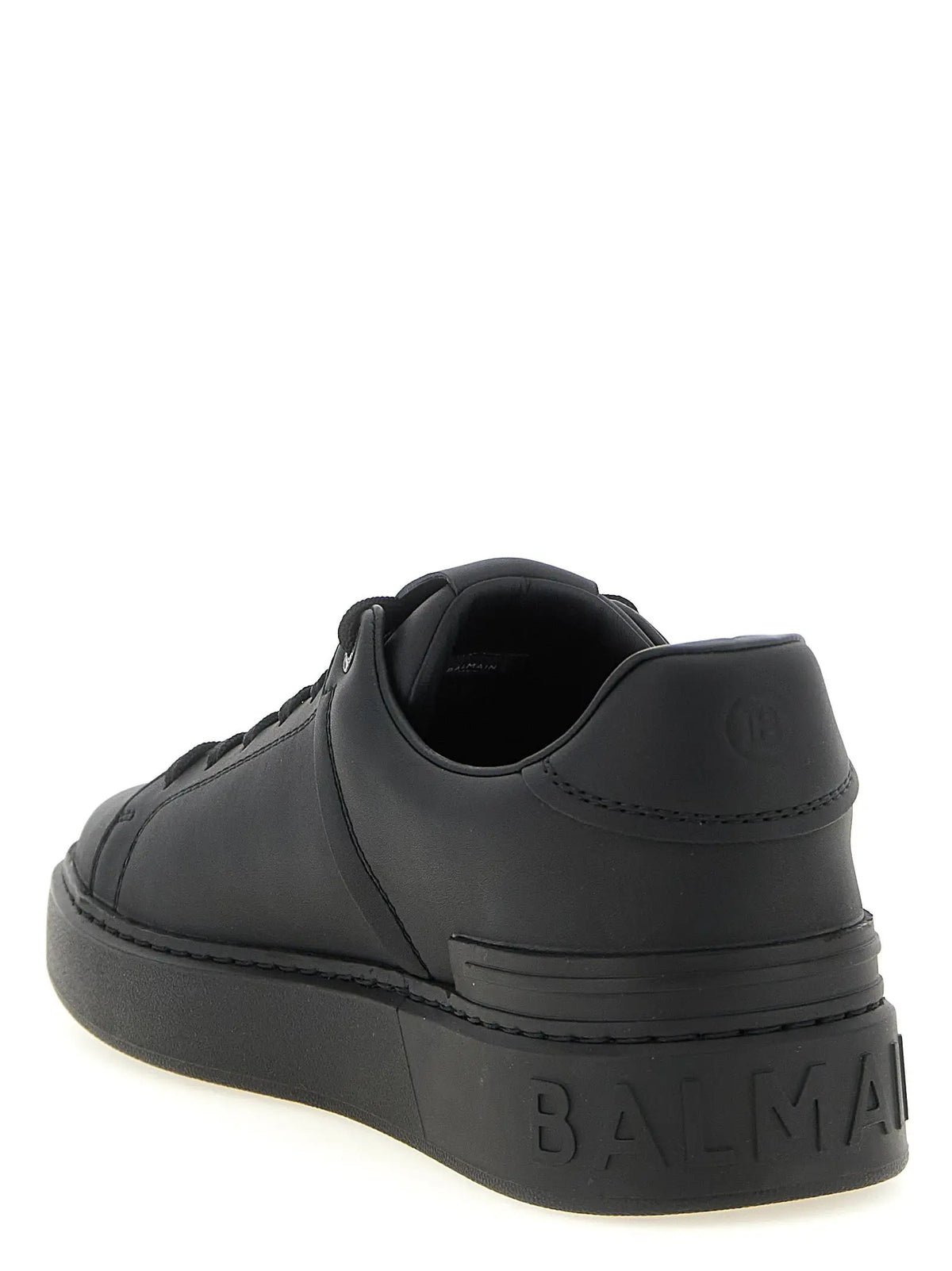Balmain baskets basses en cuir de veau noir avec semelle embossée et branding visible