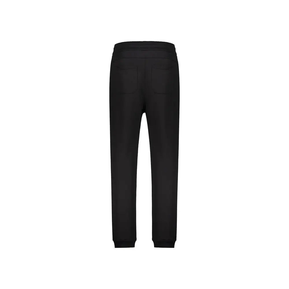 Balmain black cotton joggers with sleek tapered fit and ribbed cuffs perfect for workout pants