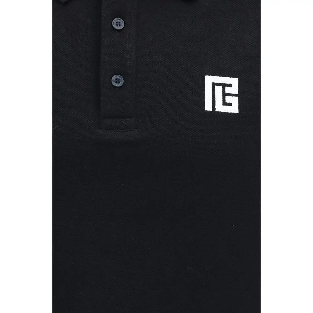 Polo balmain noir en coton avec logo blanc brodé sur la poitrine et boutons gris foncé