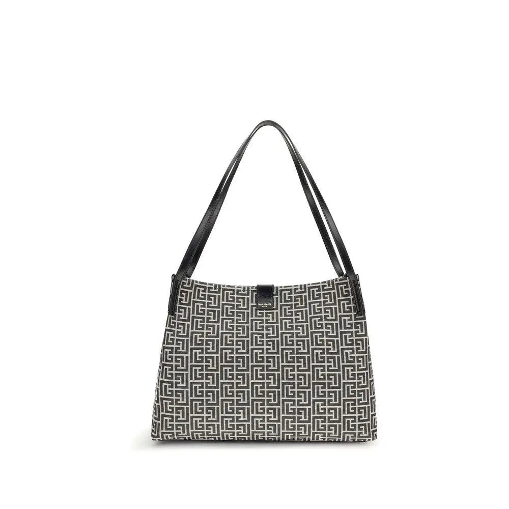 Sac bandoulière balmain noir en coton avec motif géométrique noir et blanc et anses en cuir noir