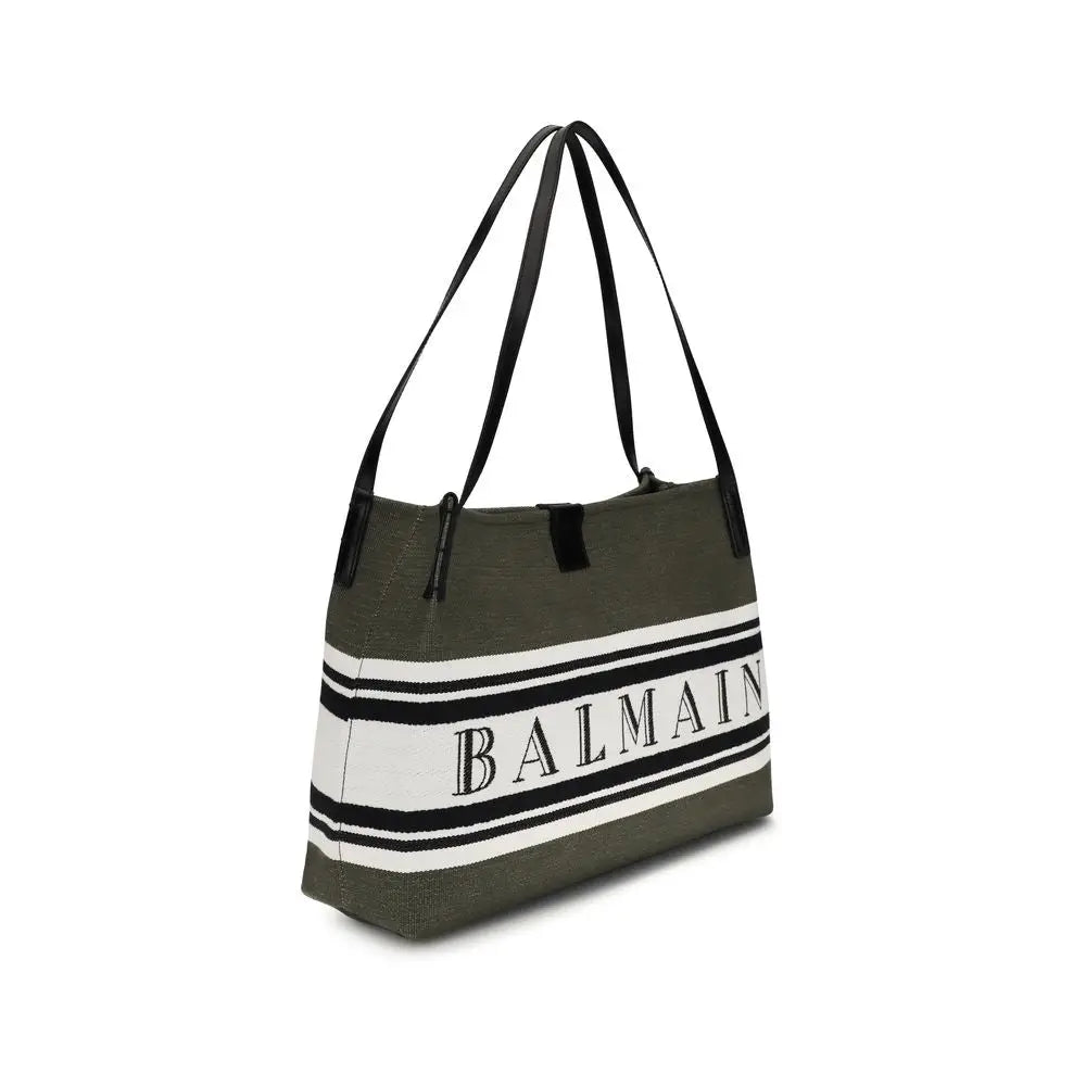 Sac balmain noir en coton avec bandoulière olive vert en toile et bandes blanches avec logo balmain en noir