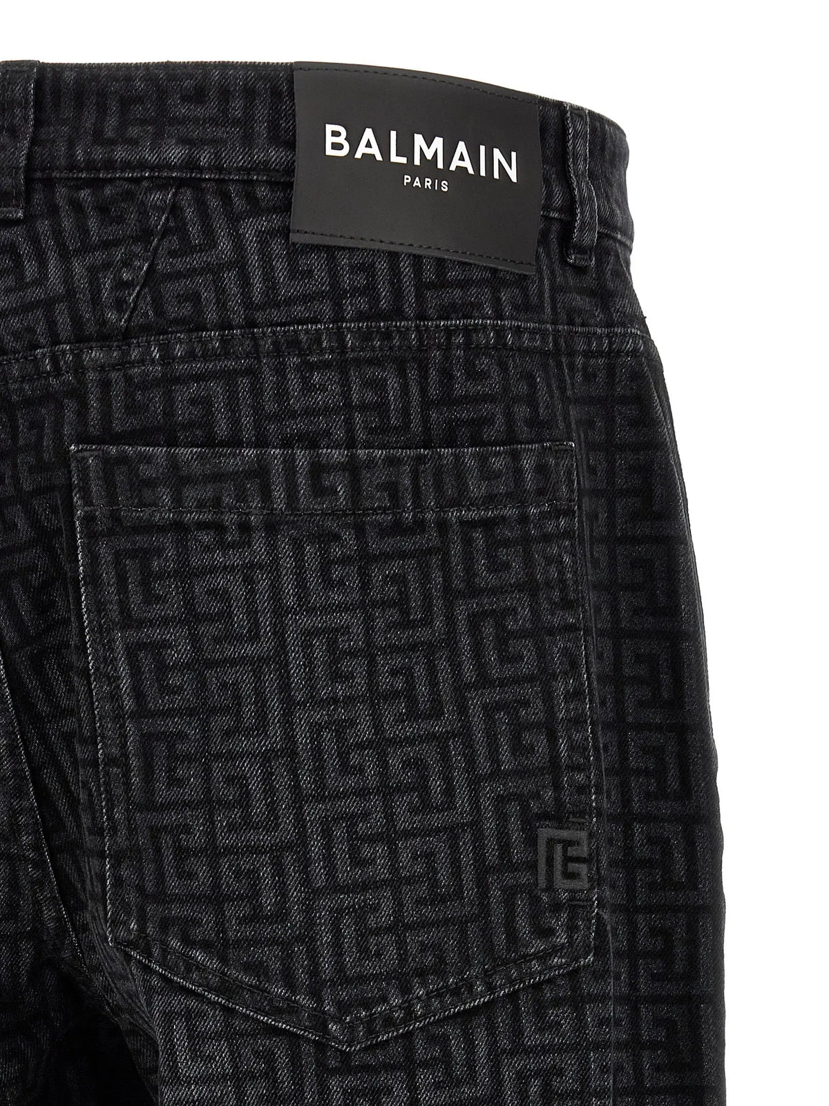 Jean droit noir en coton balmain paris avec motif géométrique répété en denim