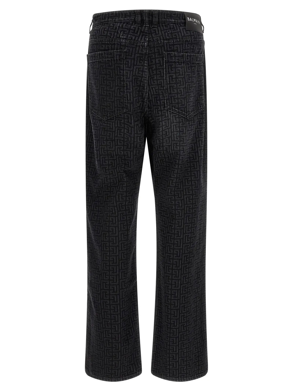 Pantalon en denim noir balmain en coton à jambes droites avec motif géométrique répétitif sur le tissu