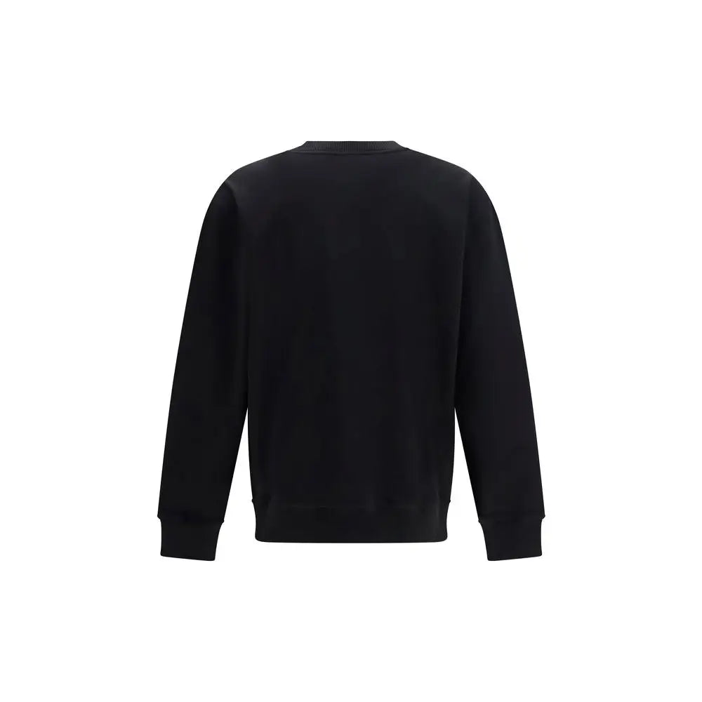 Sweatshirt balmain en coton noir à manches longues avec col rond et poignets et ourlet côtelés
