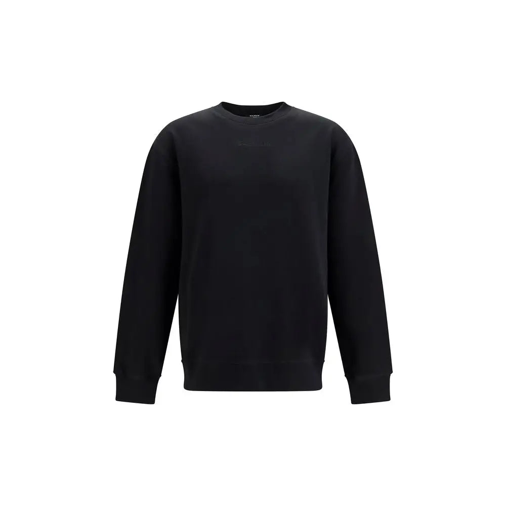 Sweatshirt noir balmain en coton à col rond avec manches longues et poignets côtelés