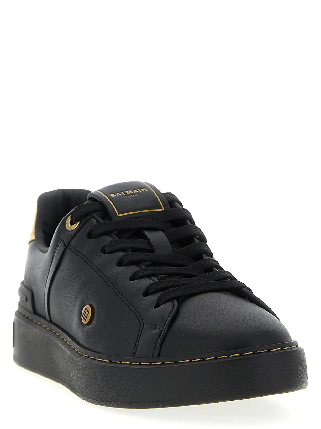 Basket balmain noir en cuir dagneau avec détails dorés et couture pour un look bas de gamme