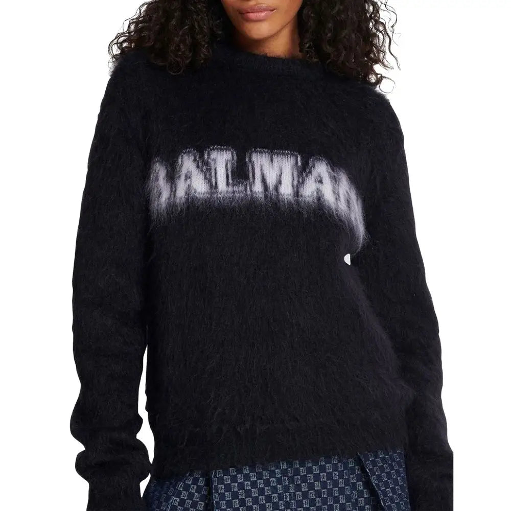 Sweatshirt balmain noir en mohair avec logo blanc usé balmain en maille duveteuse