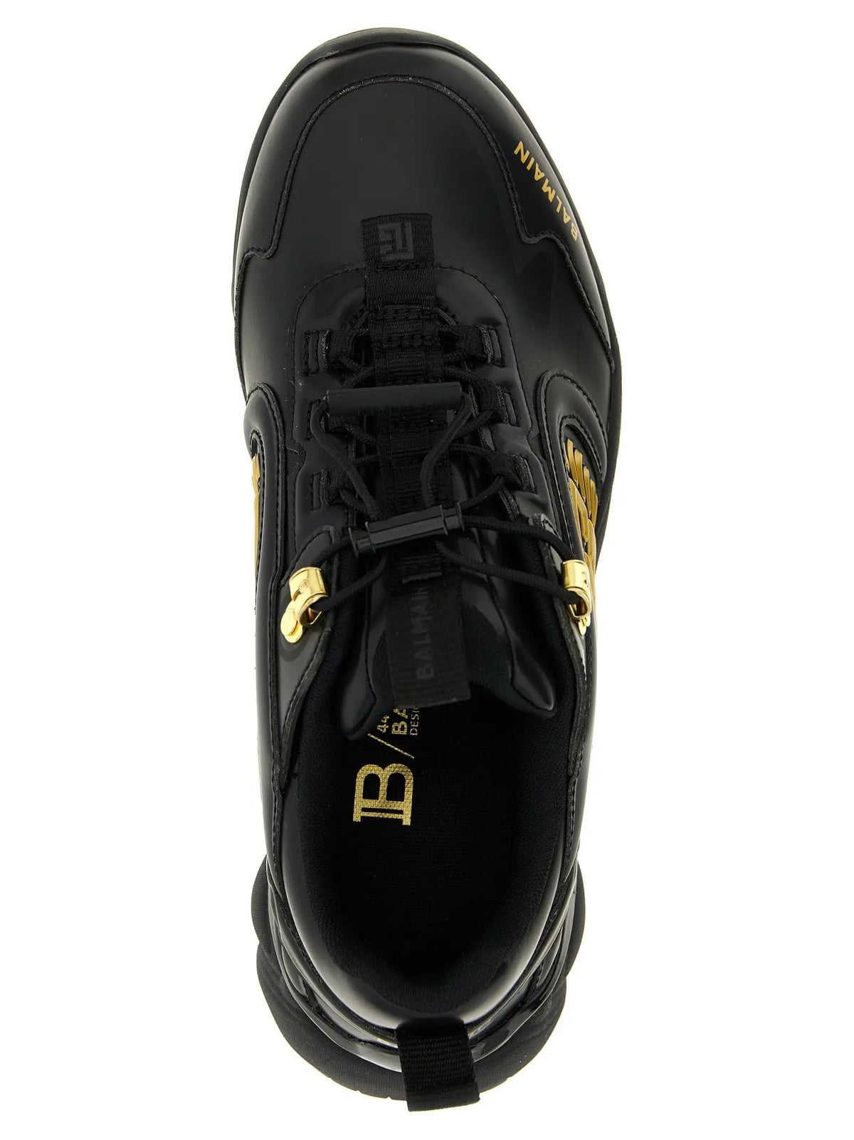 Baskets balmain noires en nylon avec dessus en cuir brillant et accents dorés sur les lacets et le logo