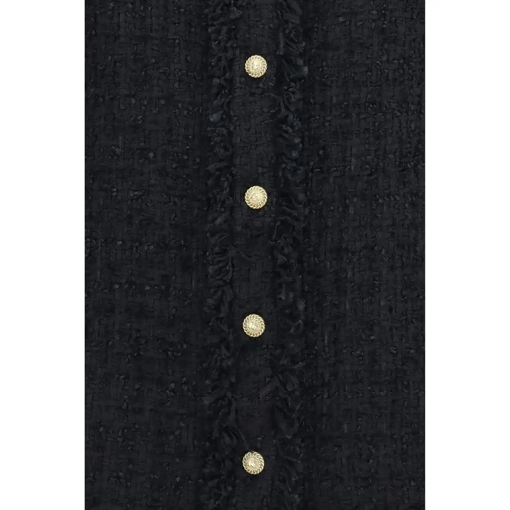 Chemise balmain noire en polyamide en tweed texturé avec quatre boutons ronds dorés alignés verticalement