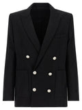 Blazer noir balmain en laine vierge avec silhouette structurée et boutons argentés double boutonnage