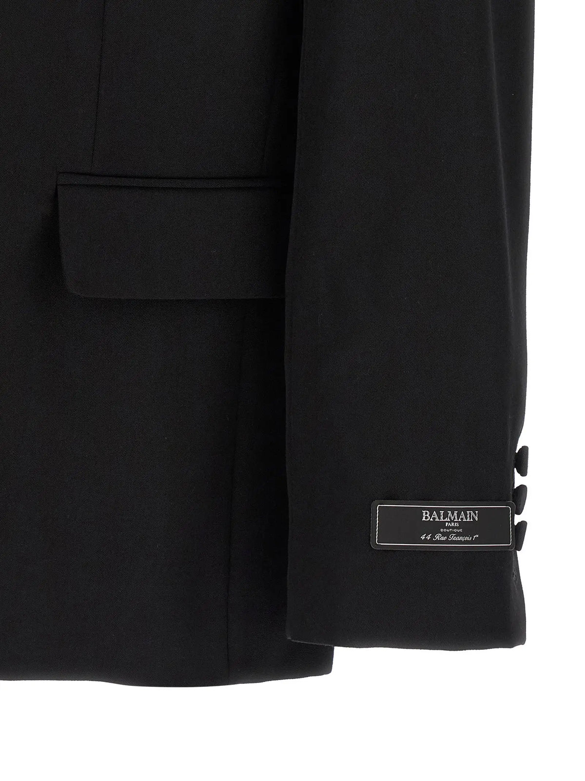 Blazer balmain noir en laine vierge avec coupe ajustée et texture subtile pour un style élégant