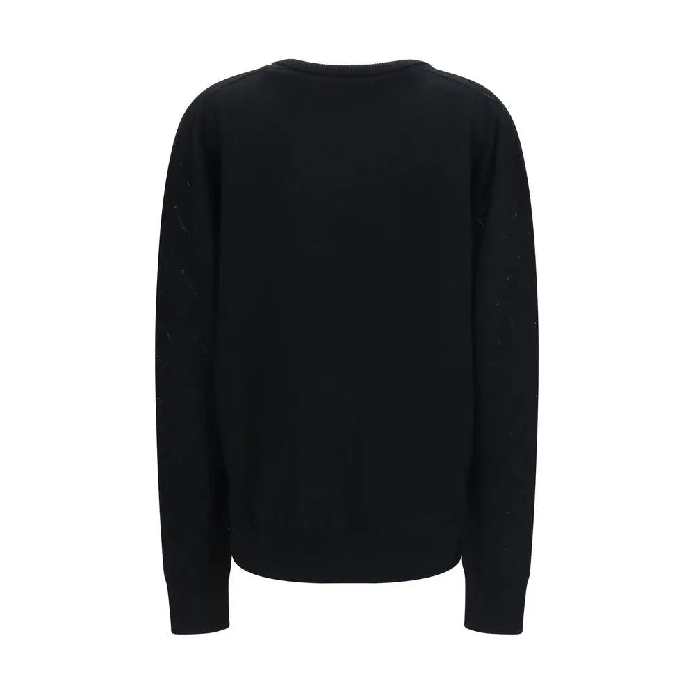 Sweatshirt balmain noir en laine avec manches longues et détails texturés subtils pour un style élégant