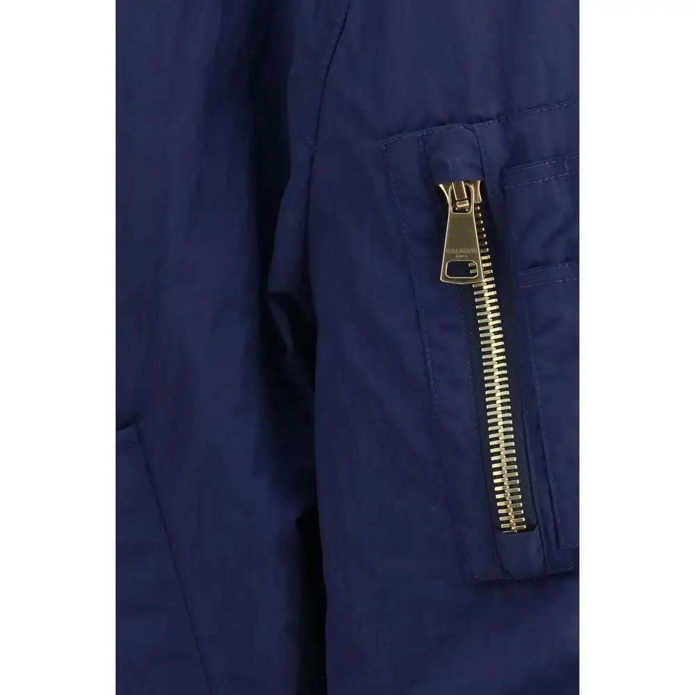 Blouson aviateur balmain bleu en polyamide avec fermeture éclair dorée sur la poche latérale