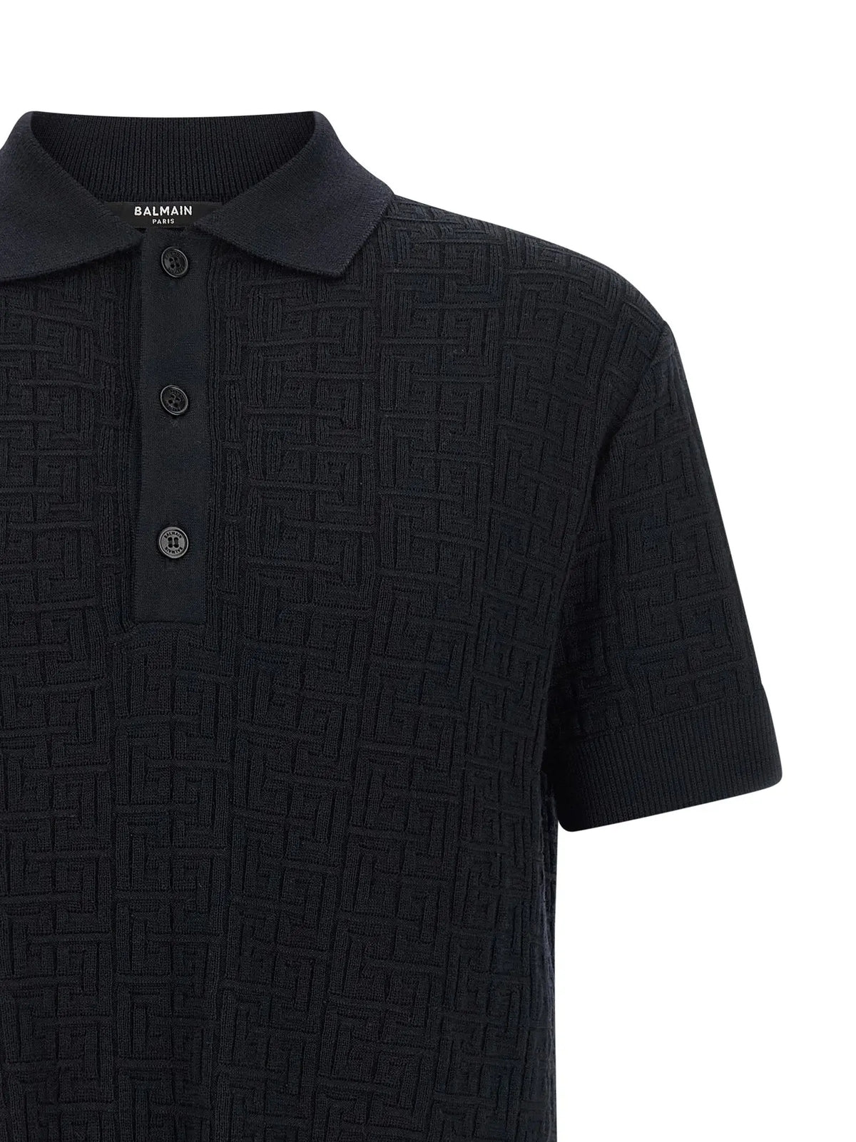 Polo balmain paris noir en laine avec motif géométrique texturé et boutons assortis