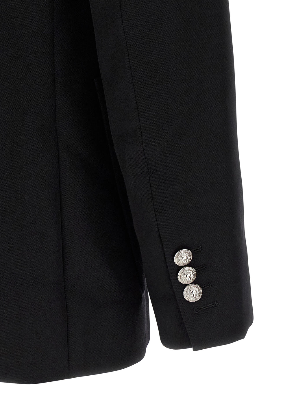 Blazer noir en laine vierge de Balmain, coupe élégante et moderne, porté sur un mannequin.