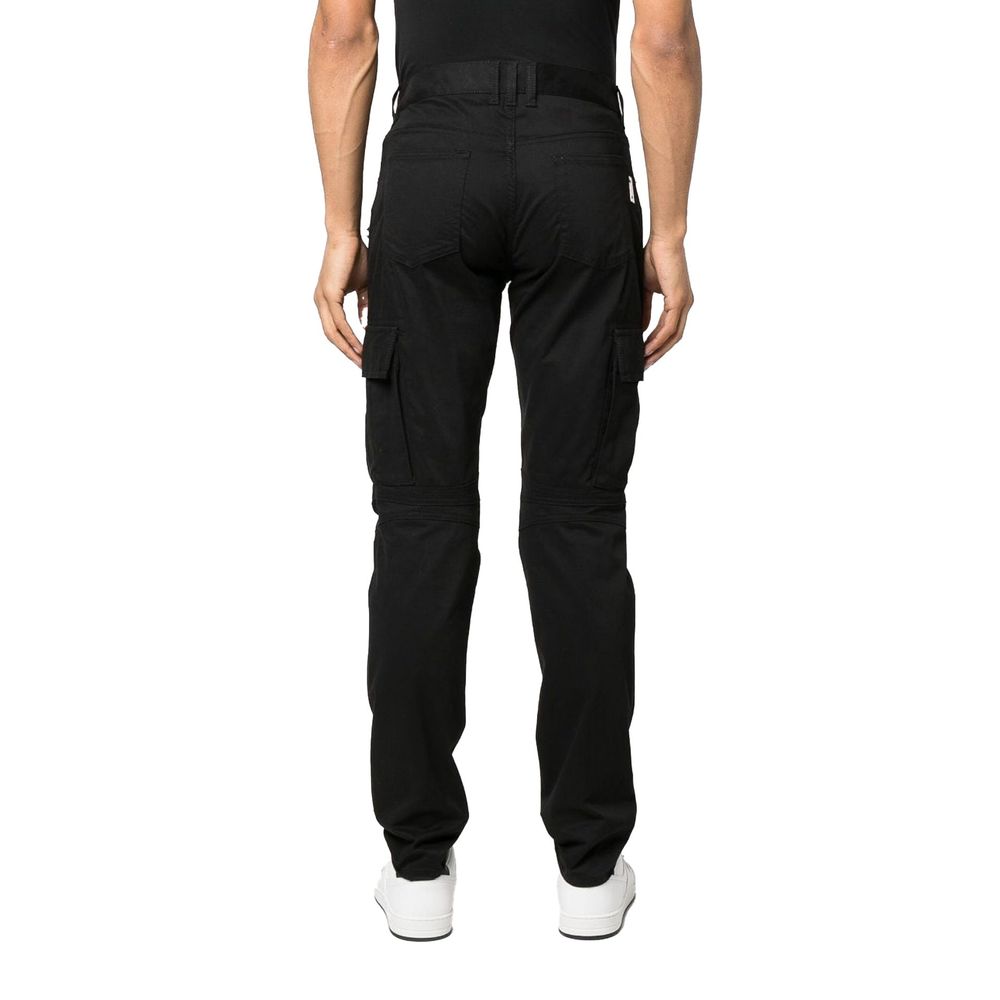 Pantalons cargo noirs en coton de la marque Balmain, avec poches latérales et coupe décontractée.