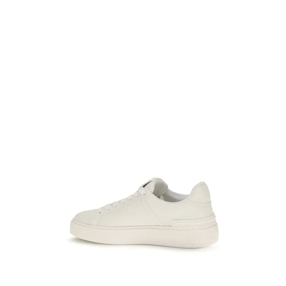 Baskets balmain blanches en cuir de veau avec semelle épaisse et design bas pour un usage athlétique