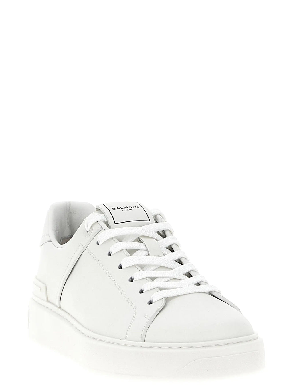 Balmain white calfskin low top sneakers en cuir blanc avec design minimaliste pour un style épuré