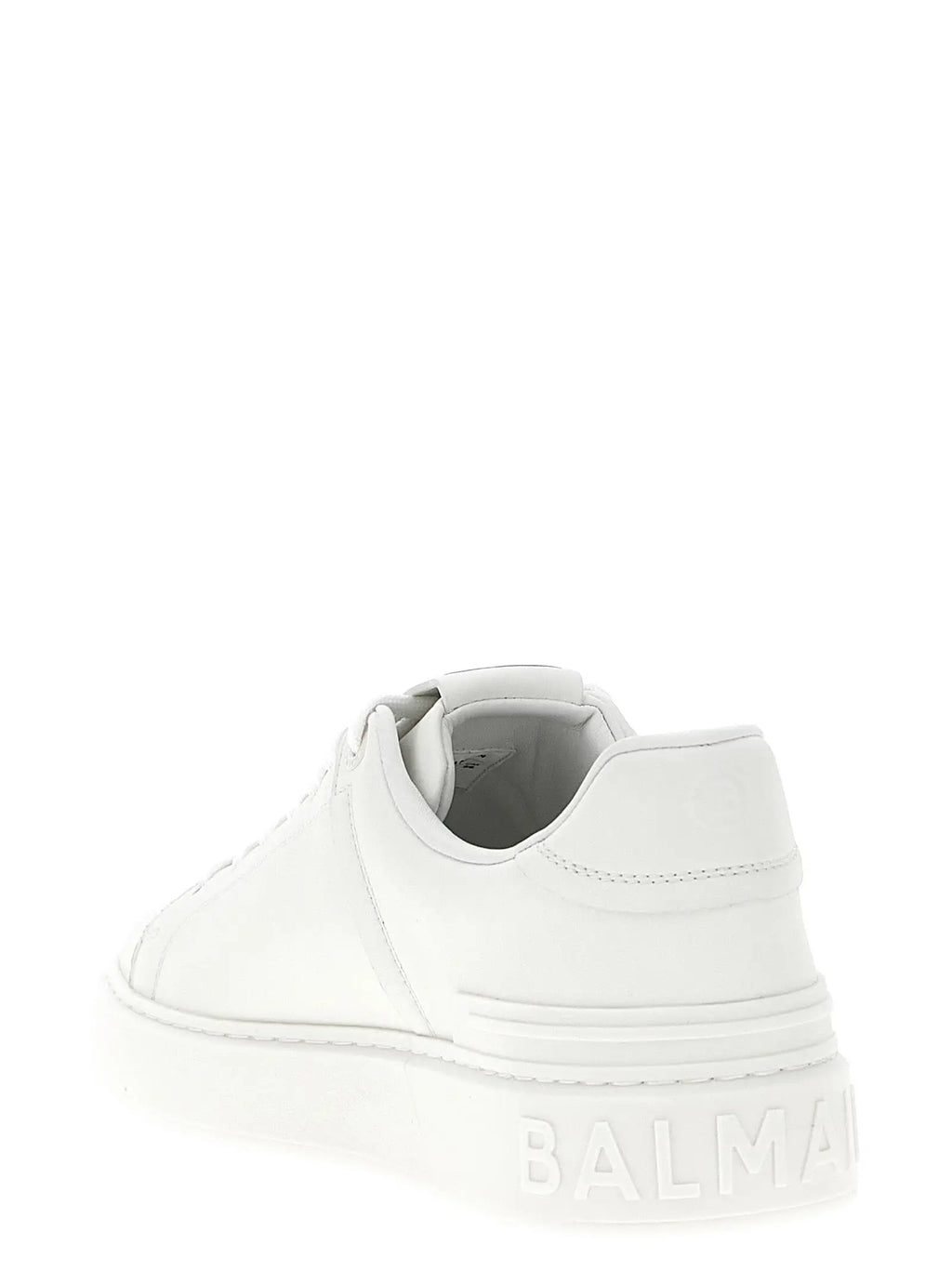 Balmain white calfskin low top sneakers with white platform sole and embossed branding on the leather upper