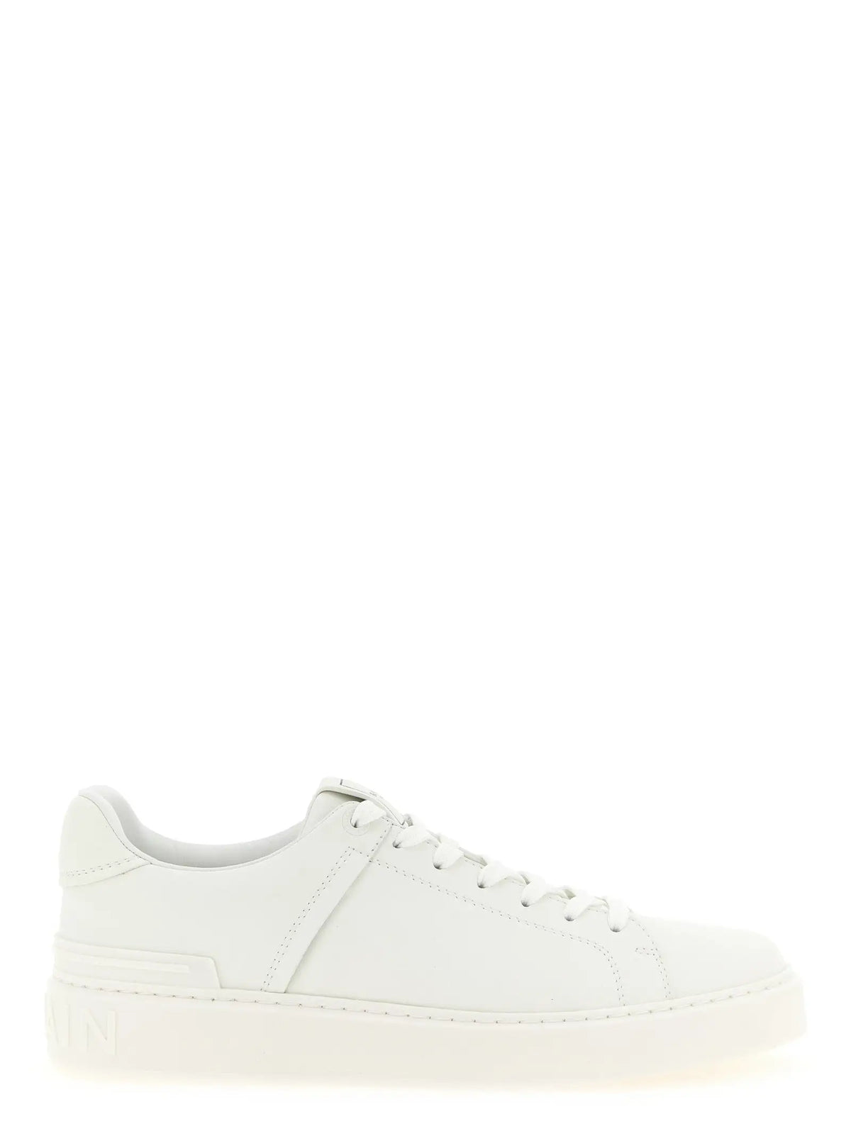 Balmain white calfskin low top sneakers en cuir blanc à design minimaliste avec détails de couture subtils