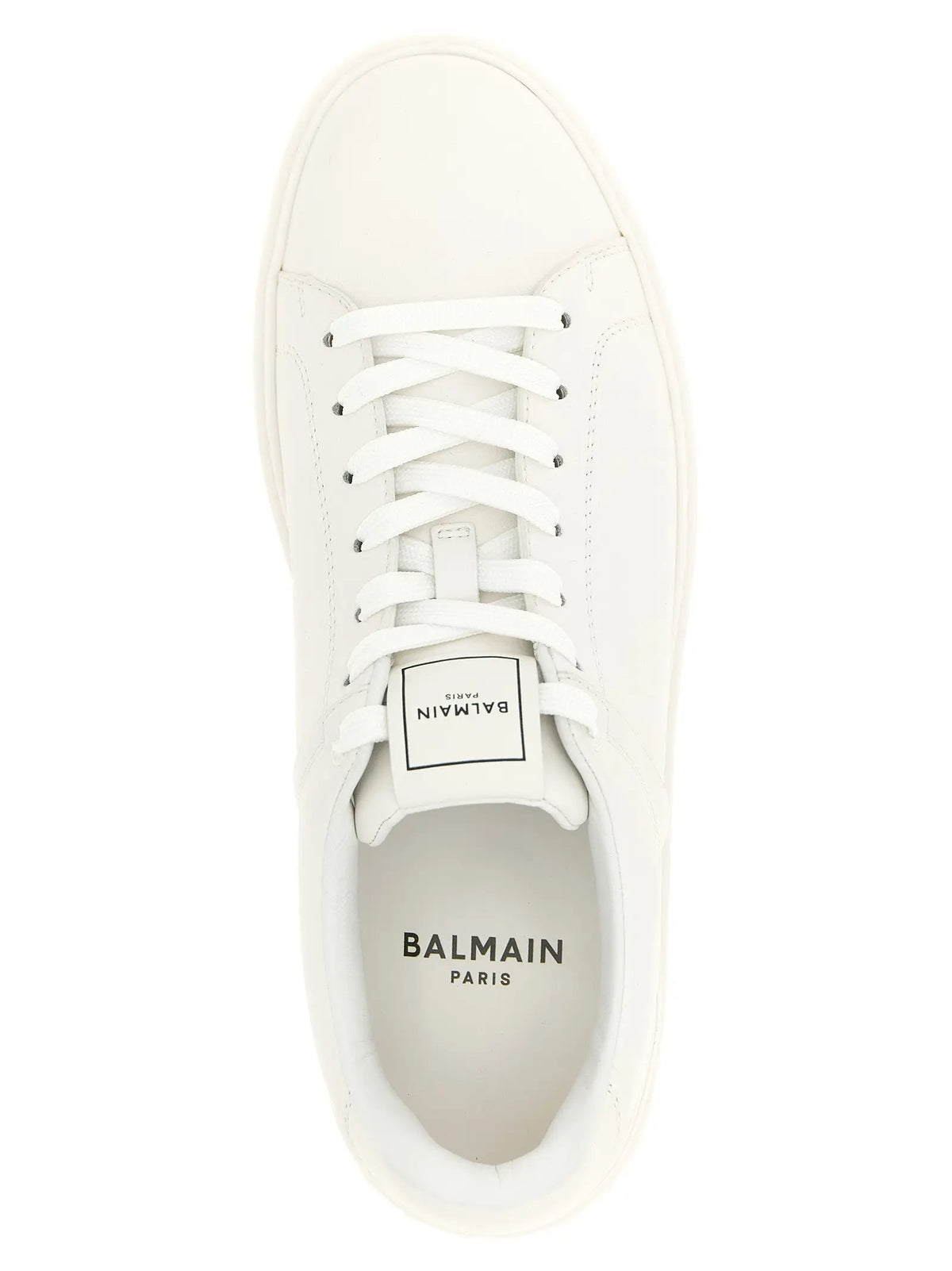 Balmain white calfskin low top sneakers with clean leather upper and matching laces in white color