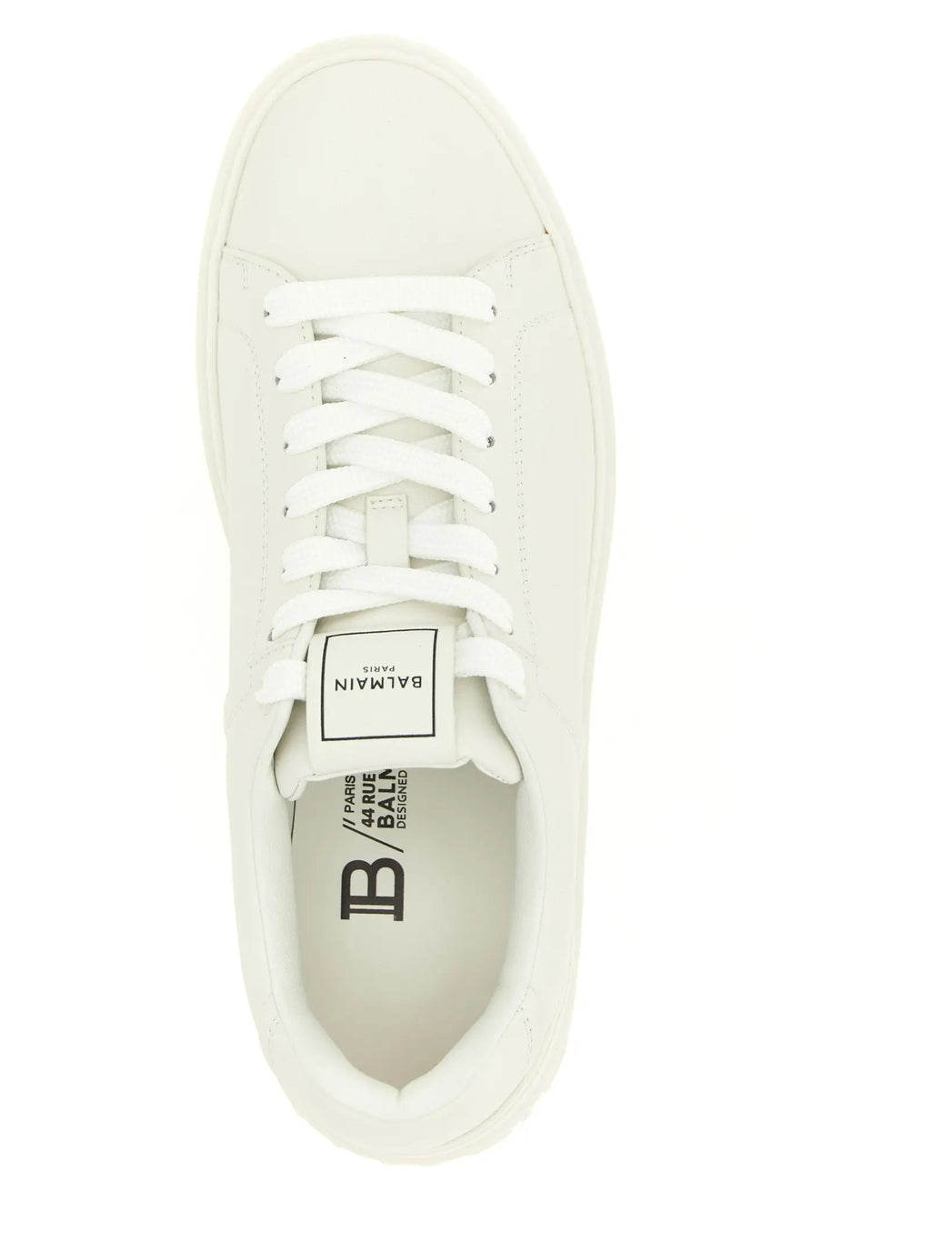 Baskets basses balmain blanches en cuir de veau avec design minimaliste et lacets assortis