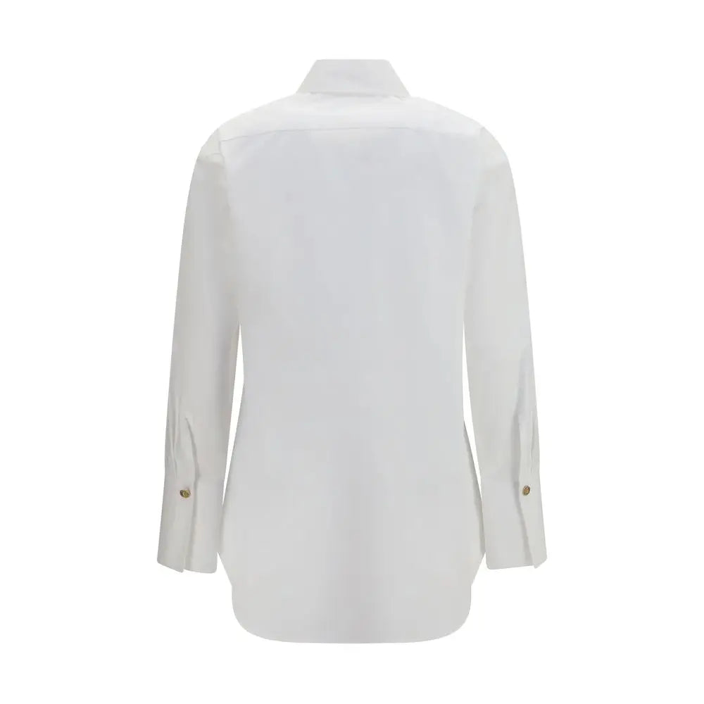 Chemise blanche en coton balmain à manches longues avec col classique et boutons dorés subtils aux poignets