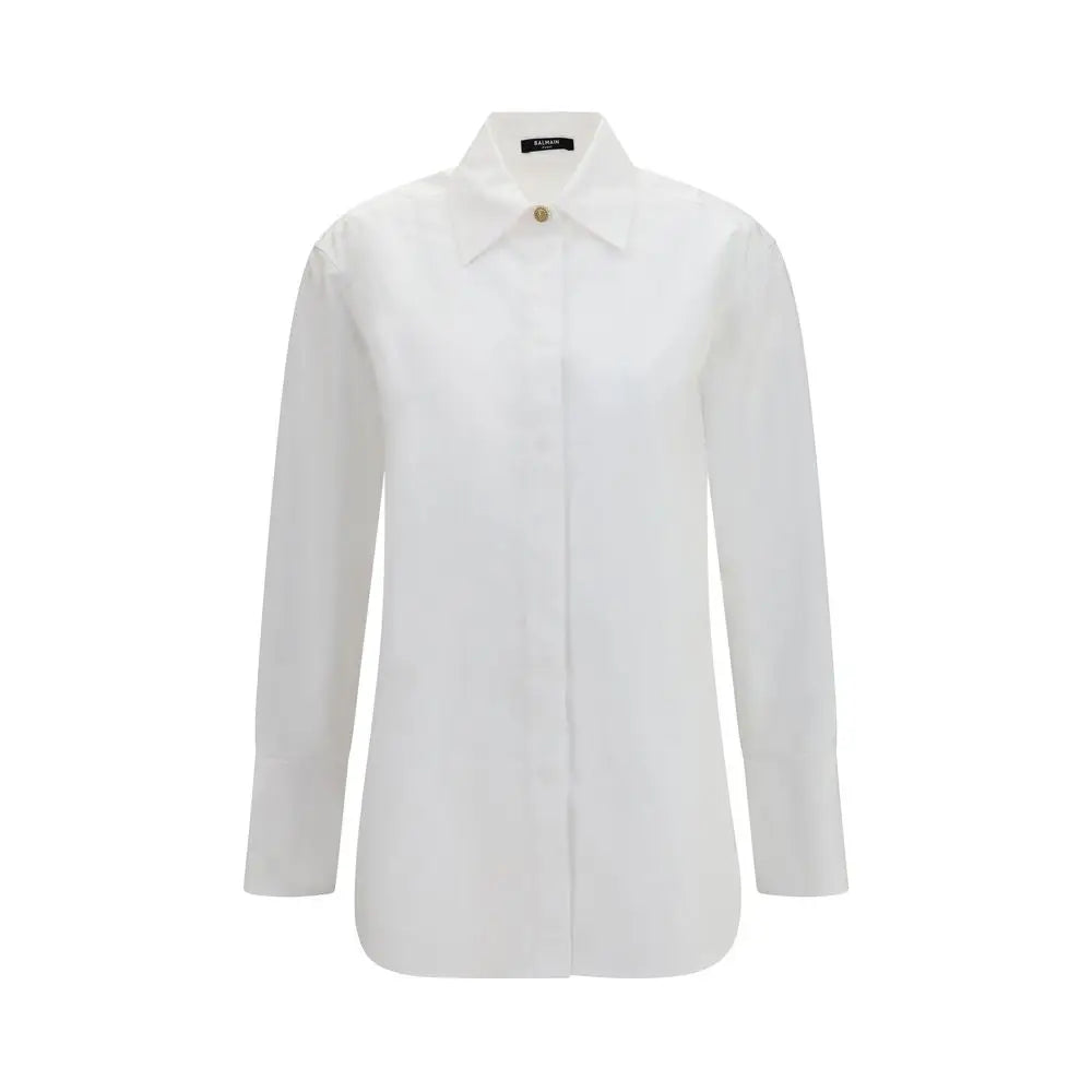 Chemise habillée en coton blanc balmain à manches longues avec col classique et boutons dorés subtils