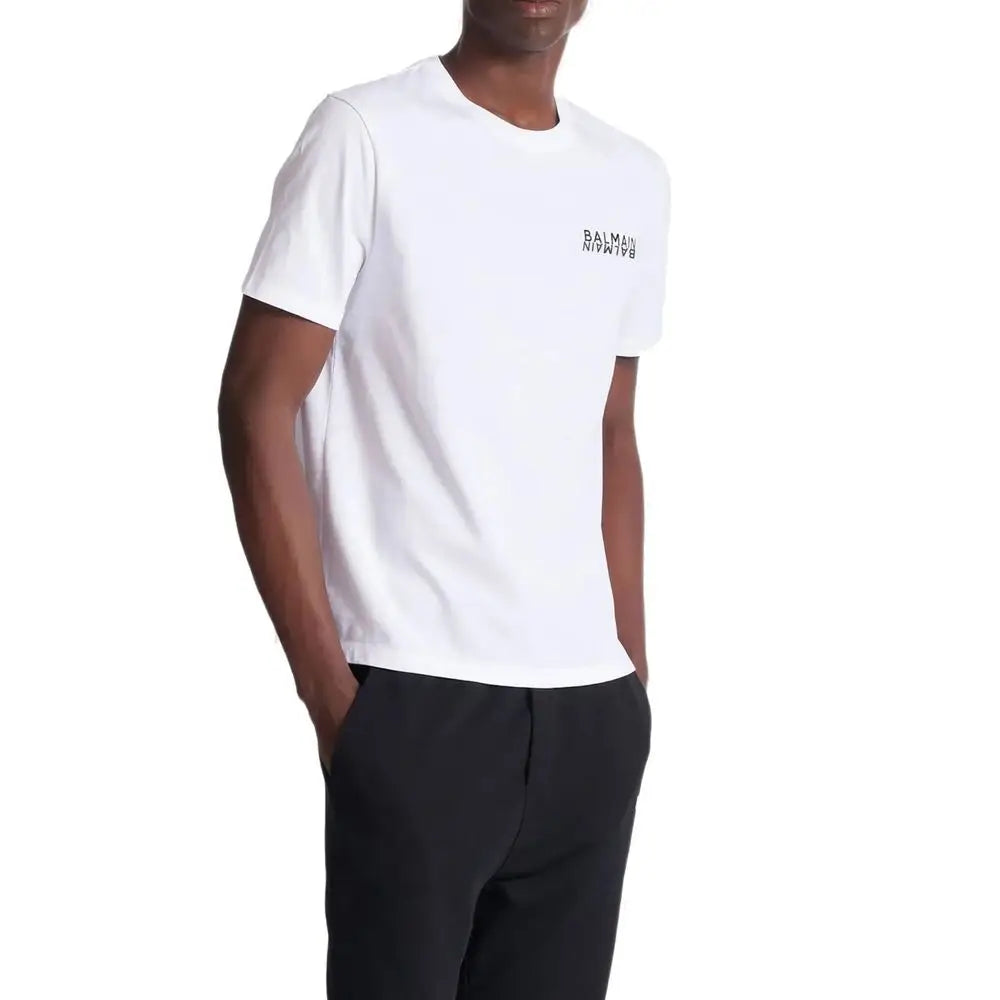 T-shirt balmain blanc en coton avec un logo noir subtil sur la poitrine côté gauche