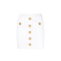 Mini jupe blanche balmain en polyester avec cinq boutons dorés sur le devant
