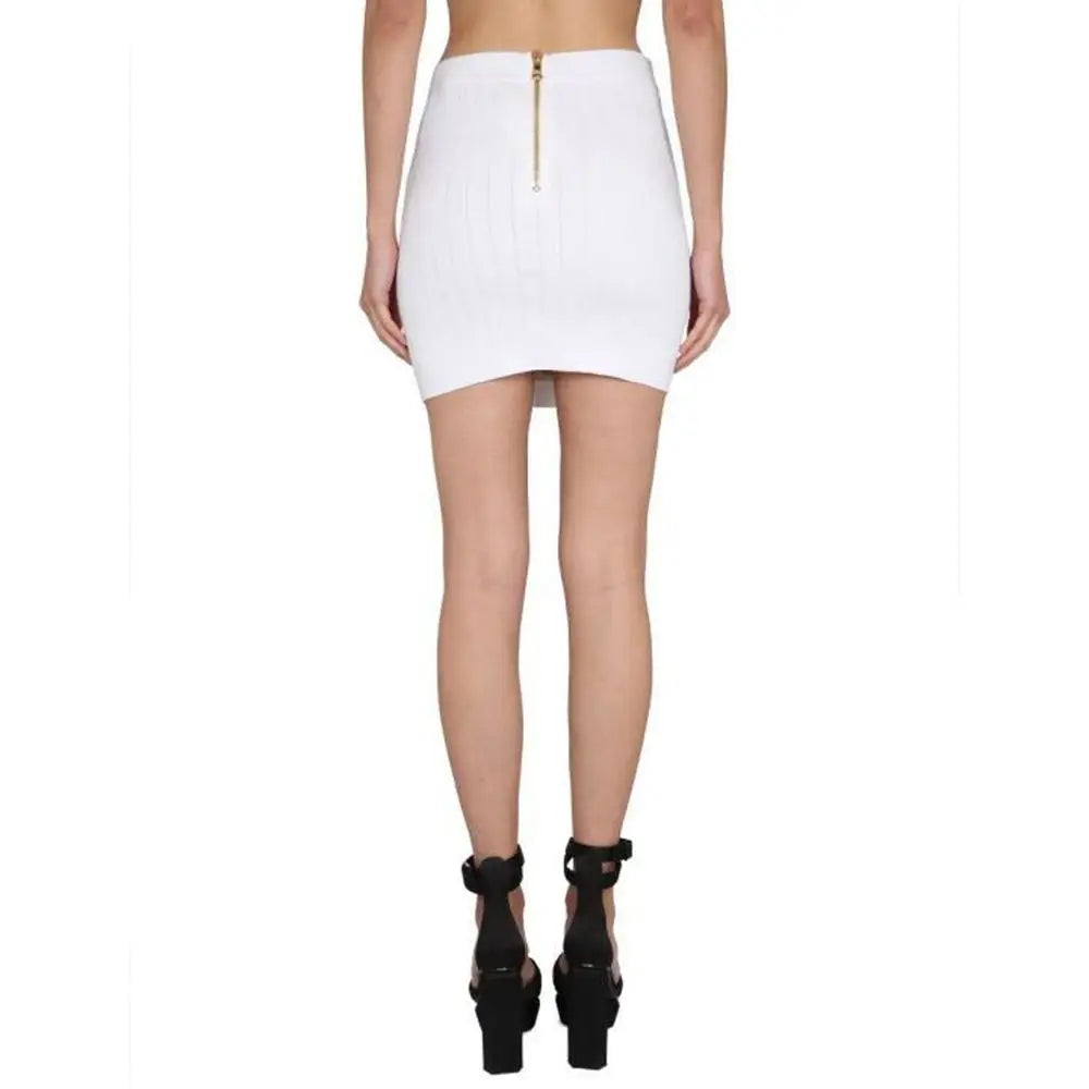 Jupe mini blanche balmain en polyester avec fermeture éclair dorée visible au dos taille haute