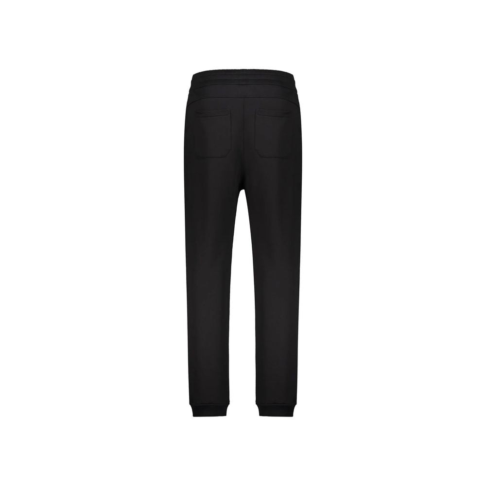 Pantalons de jogging en coton noir Balmain, style décontracté, avec logo discret, pour homme ou femme.