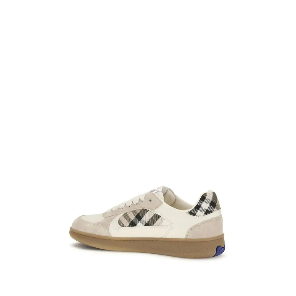 Sneaker basse burberry beige en cuir de veau avec accents à damier noir et blanc et semelle en caoutchouc beige