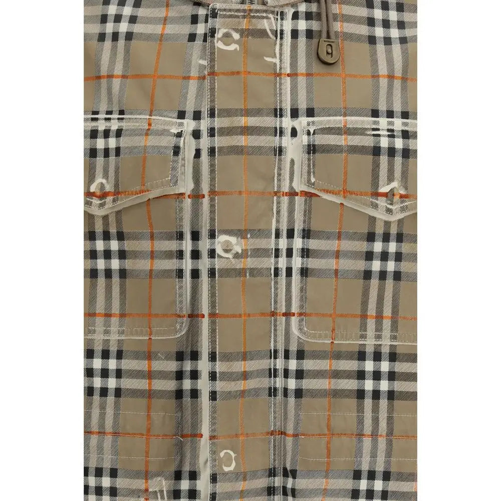 Burberry beige cotton parka with beige and black plaid, orange accent stripes, clear plastic pockets, and metallic zipper pull