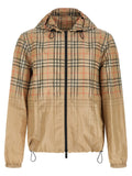 Veste burberry en viscose beige à capuche avec motif à carreaux noir et beige fondu en bas avec cordons de serrage
