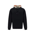 Sweatshirt burberry noir en coton avec capuche doublure rayée contrastante et cordons ajustables