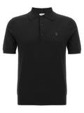 Polo Burberry noir en laine avec manches courtes, logo brodé subtil et patte de boutonnage élégant