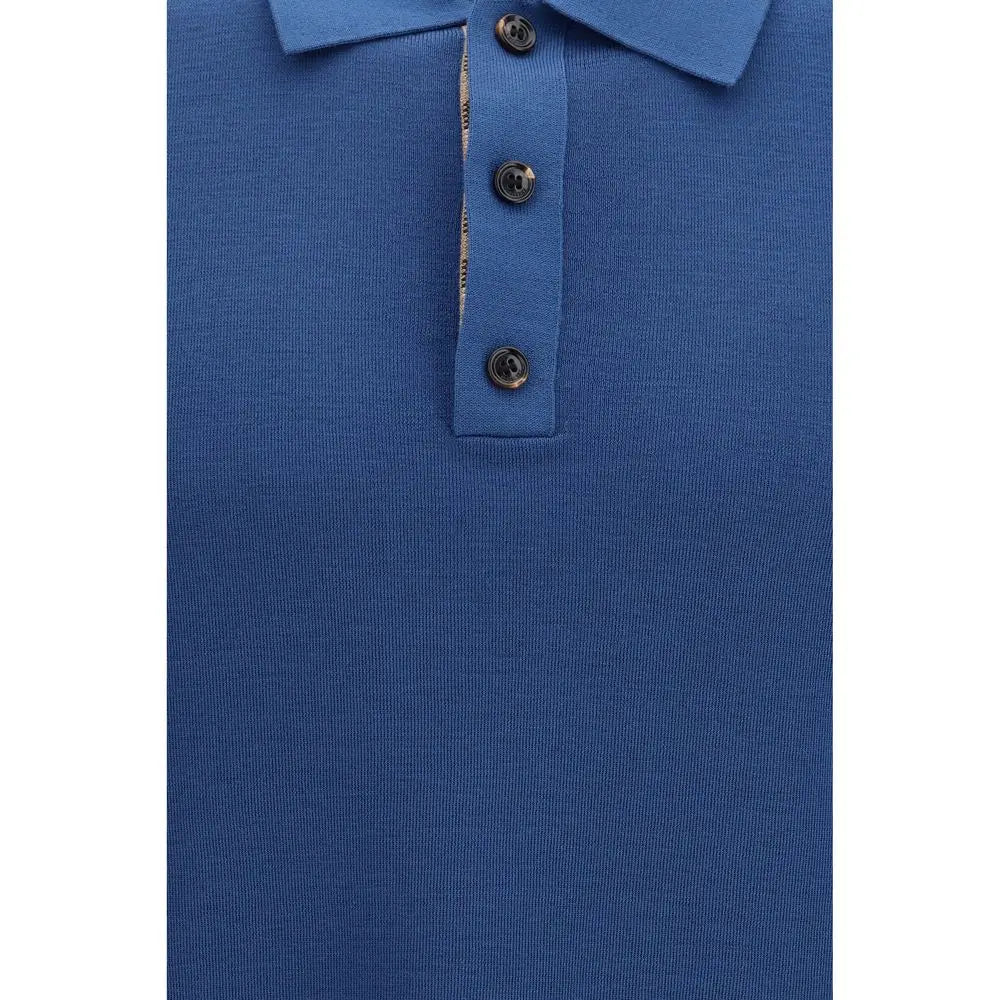 Polo en laine burberry bleu royal avec texture en maille boutons métalliques foncés et intérieur plastron à motif subtil