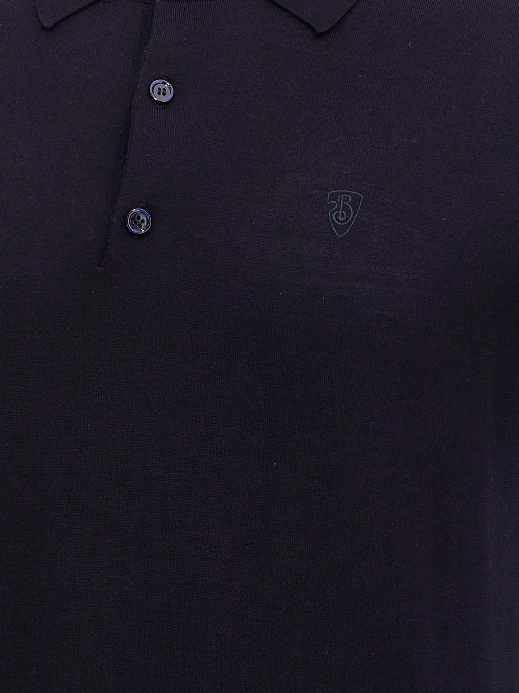Chemise polo burberry en laine bleu avec logo brodé discret et boutons foncés sur la poitrine
