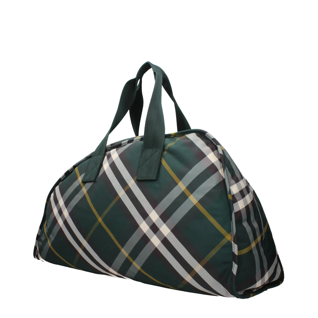 Sac de voyage burberry en tissu vert à carreaux avec rayures blanches grises et dorées