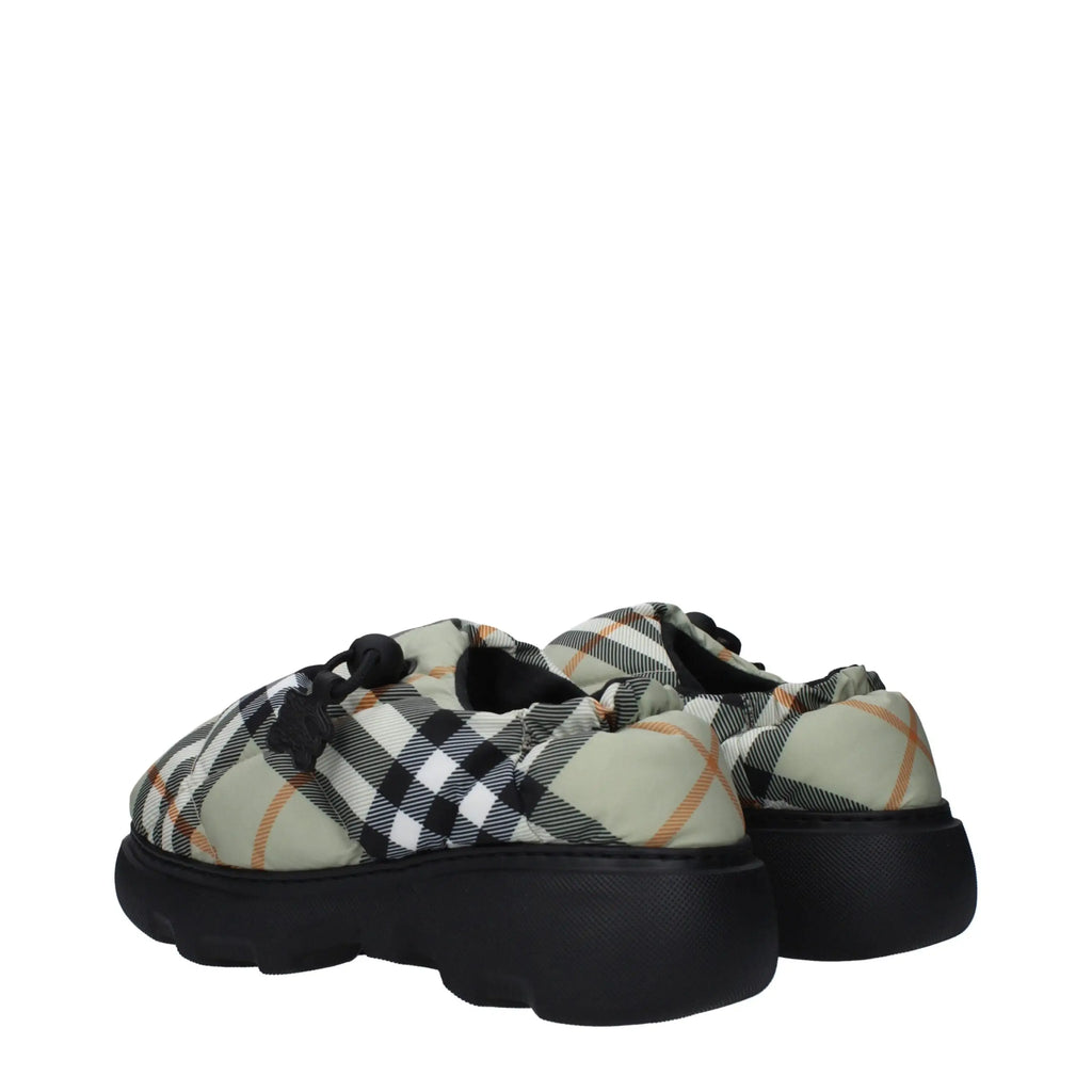 Burberry green fabric slip-on loafers with black and beige plaid pattern and thick black rubber soles