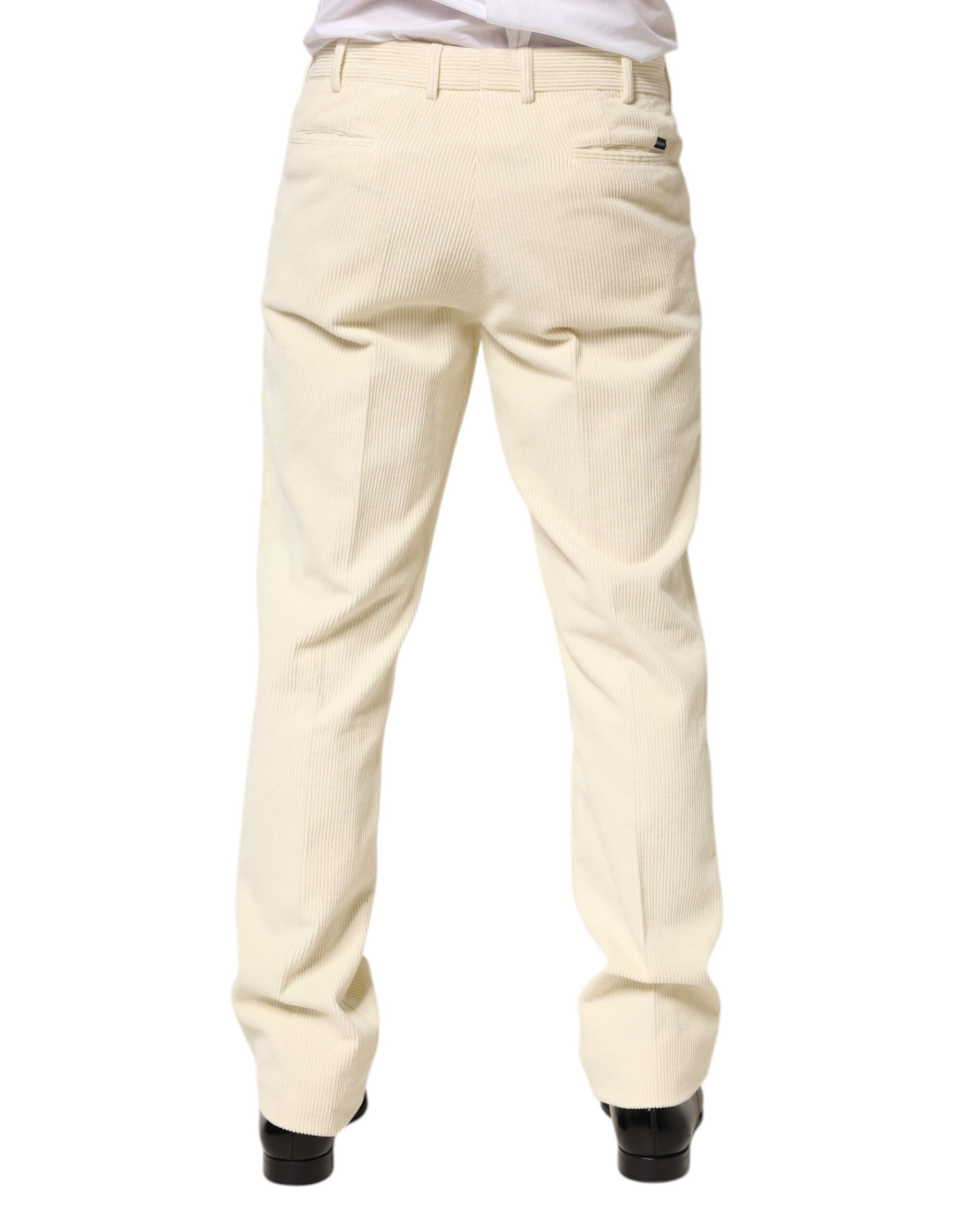 Pantalon homme Burberry beige en velours côtelé en coton, coupe droite, style élégant et classique.