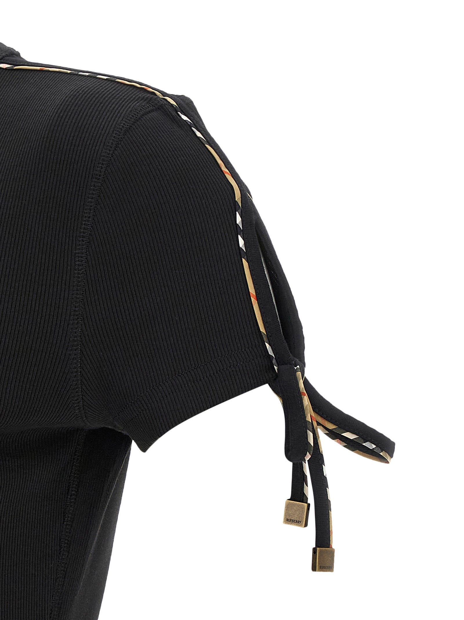 Robe courte noire en coton de Burberry, élégante et décontractée, avec détails sophistiqués visibles sur l'image.