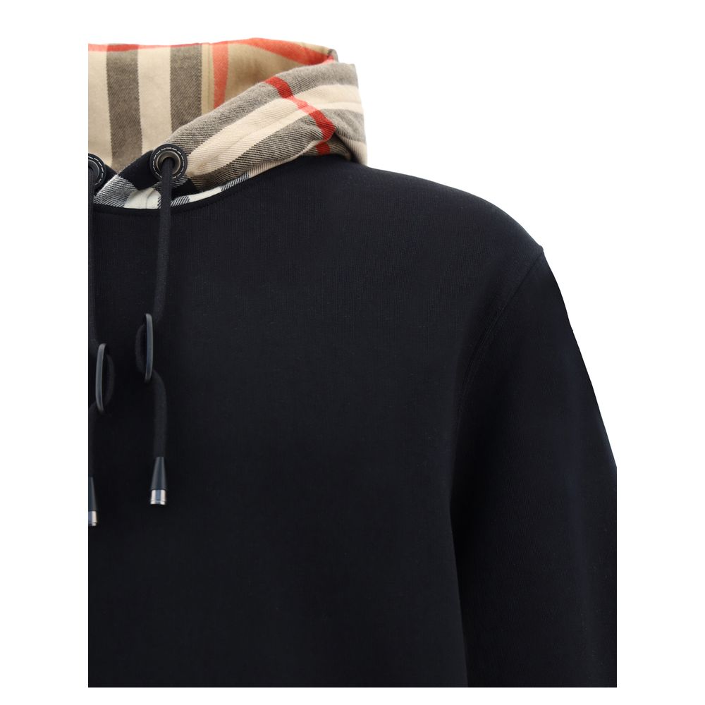 Sweat-shirt noir en coton de Burberry avec logo emblématique imprimé, manches longues et coupe décontractée.