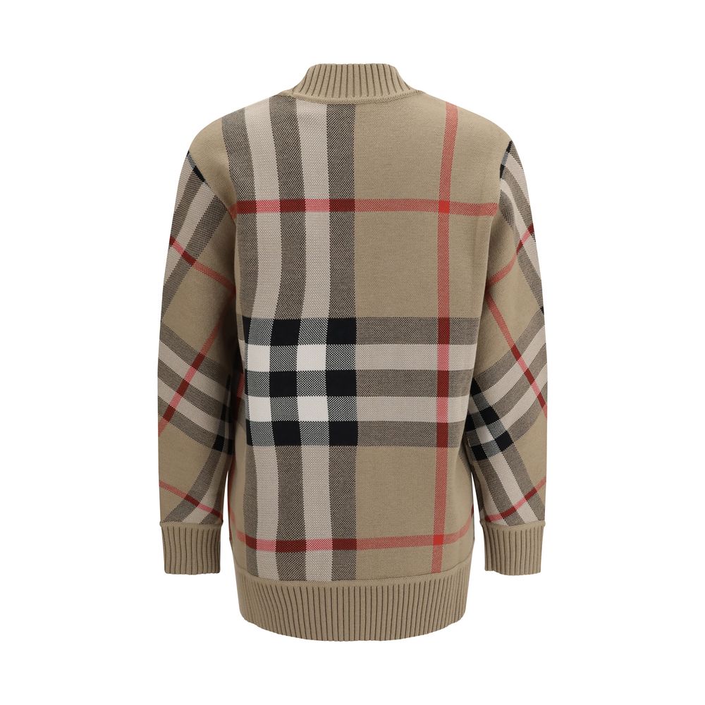 Sweat-shirt beige en polyester de Burberry, design décontracté avec logo discret, porté sur mannequin.