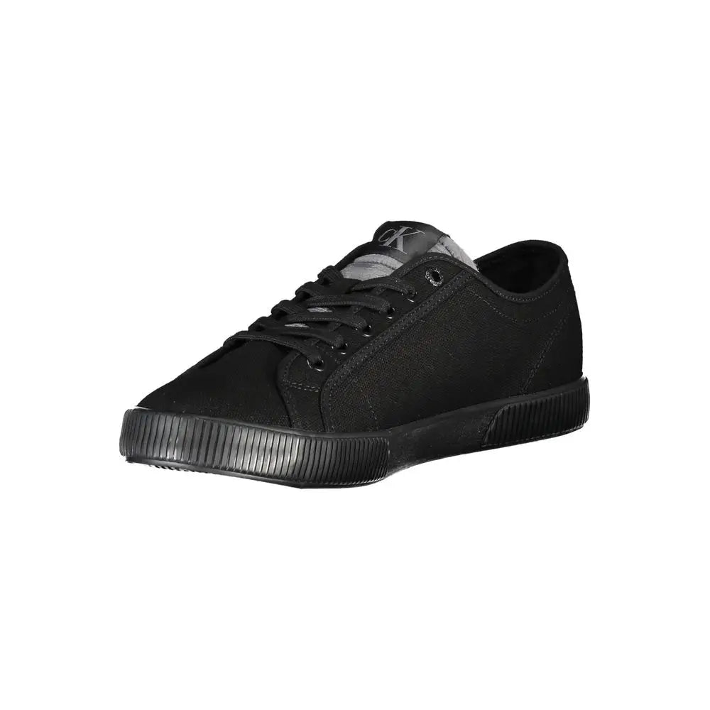 Calvin klein black cotton sneaker en toile avec semelle en caoutchouc et logo gris subtil sur la languette