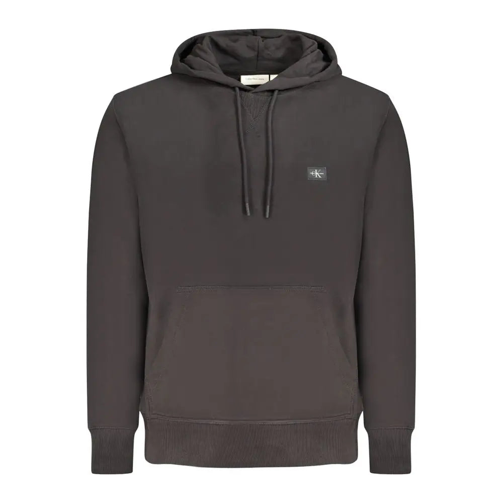 Calvin Klein black cotton men’s hoodie with dark gray fabric, subtle logo patch on chest, and matching drawstrings