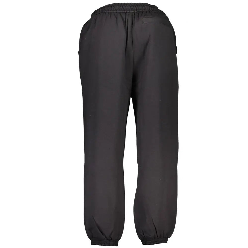 Joggers noirs calvin klein en coton pour homme avec taille élastique et finitions mate lisses et poignets fuselés