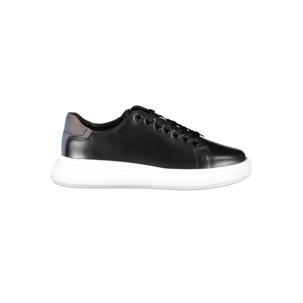 Calvin Klein black leather women sneaker low-top with white rubber sole and subtle gray heel accent